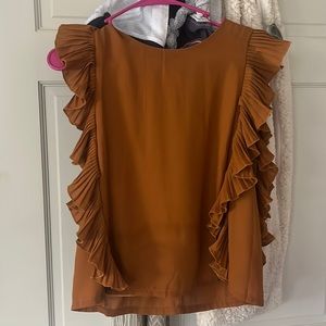 TCEC burnt orange ruffle top